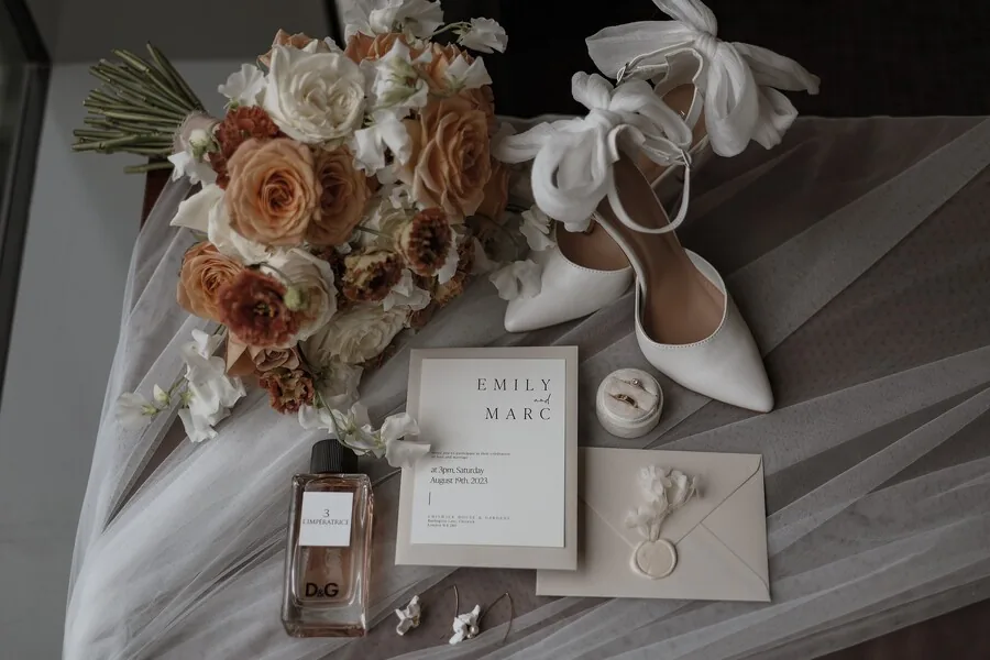 Floral place-card detail with calligraphy