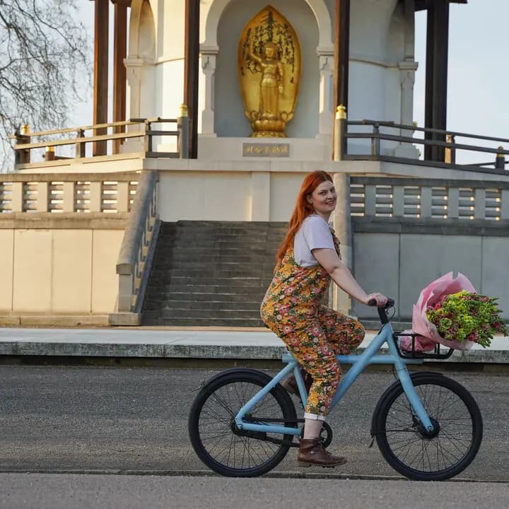 Moyses Stevens delivering flowers locally with our shop bike