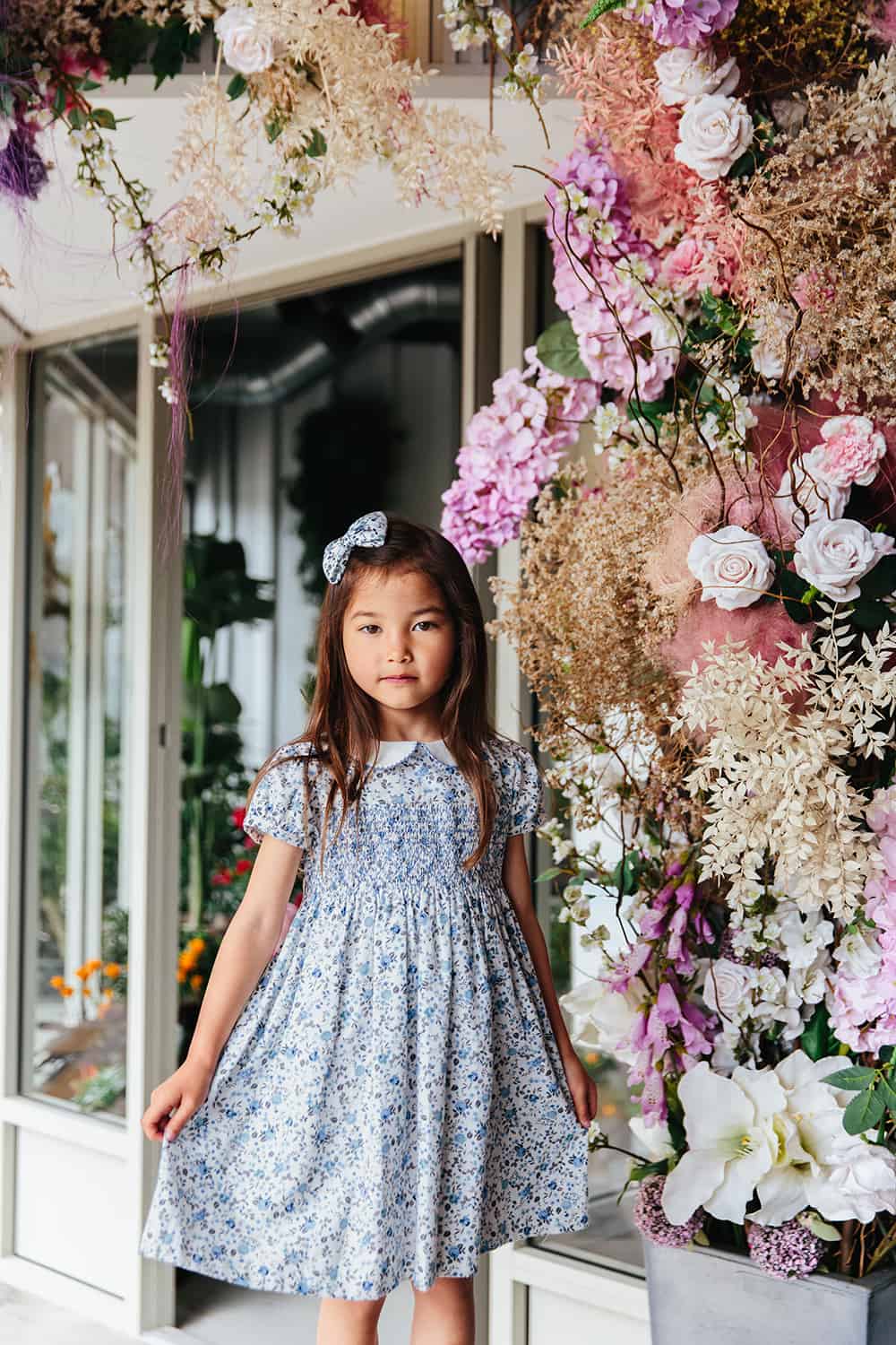 Trotters London - Blue Floral Arabella Smocked Dress